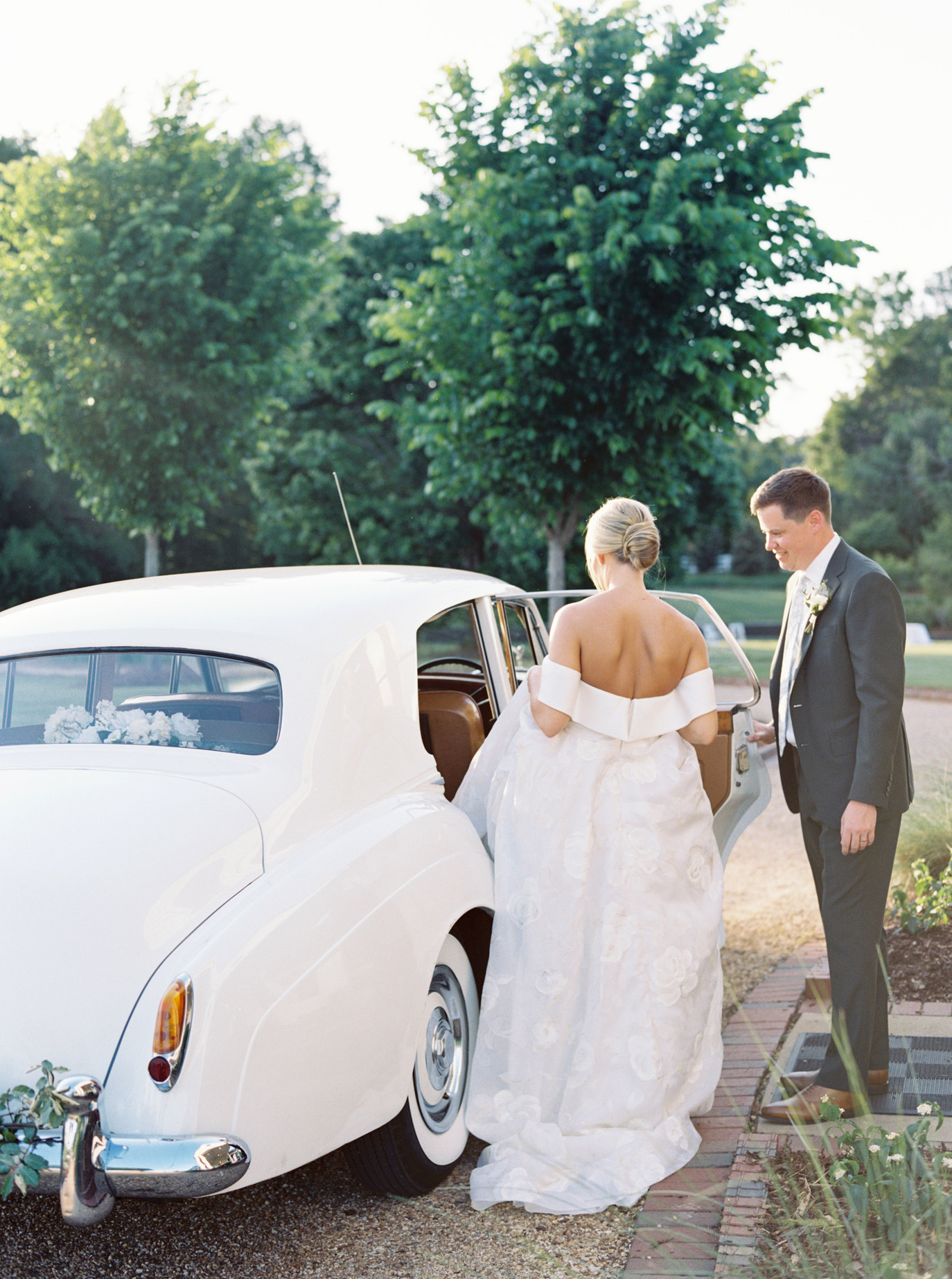 pursell farms wedding, newlywed couple in luxury classic car